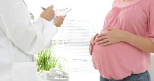 stock-footage-doctor-talking-to-her-pregnant-patient-in-her-office-at-the-hospital.jpg